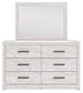 Cayboni King Panel Bed with Mirrored Dresser, Chest and Nightstand