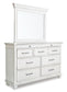 Kanwyn King Panel Bed with Mirrored Dresser, Chest and Nightstand