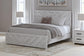 Cayboni King Panel Bed with Mirrored Dresser and Nightstand