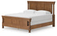 Chadworth King Poster Bed with Mirrored Dresser